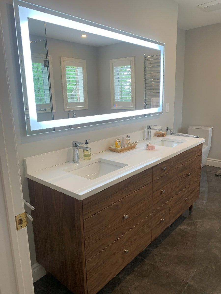Master bathroom with a walnut double vanity